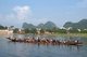 China: Dragon boats on the Li River with Seven Star Park in the background, Guilin, Guangxi Province